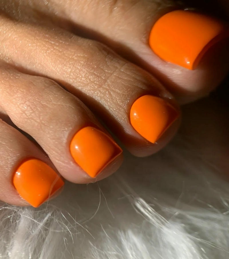 mẫu nail chân màu cam tươi