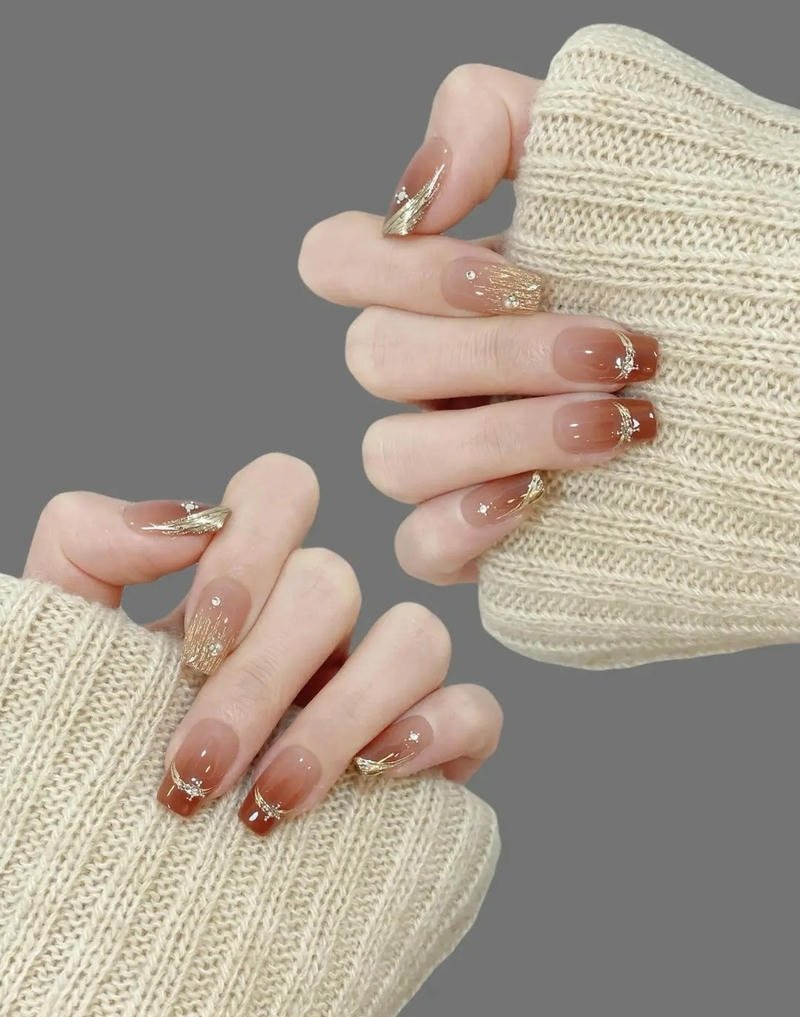 nail ombre đính đá vàng